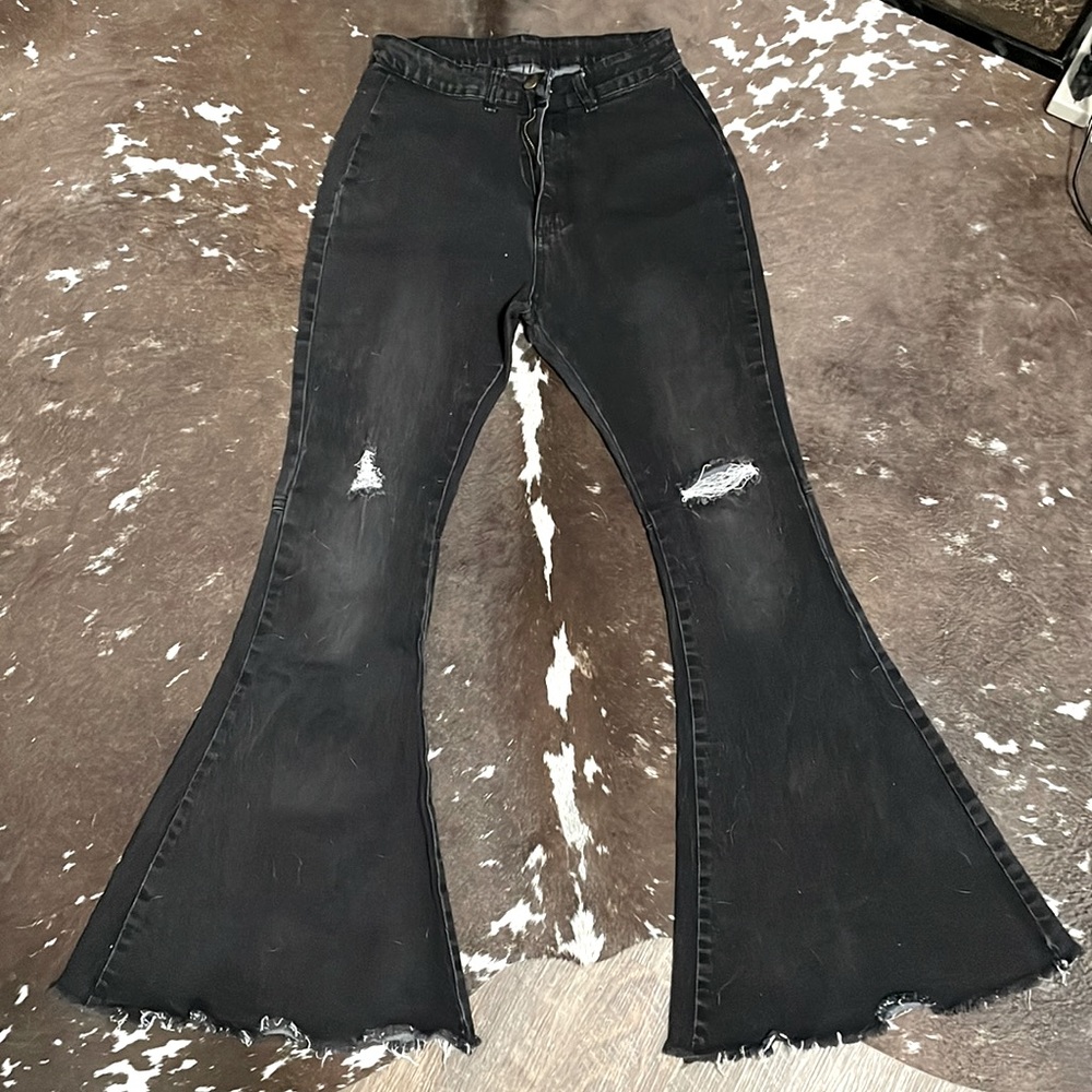 Black rip-knee flare bell bottom stretchy jeans